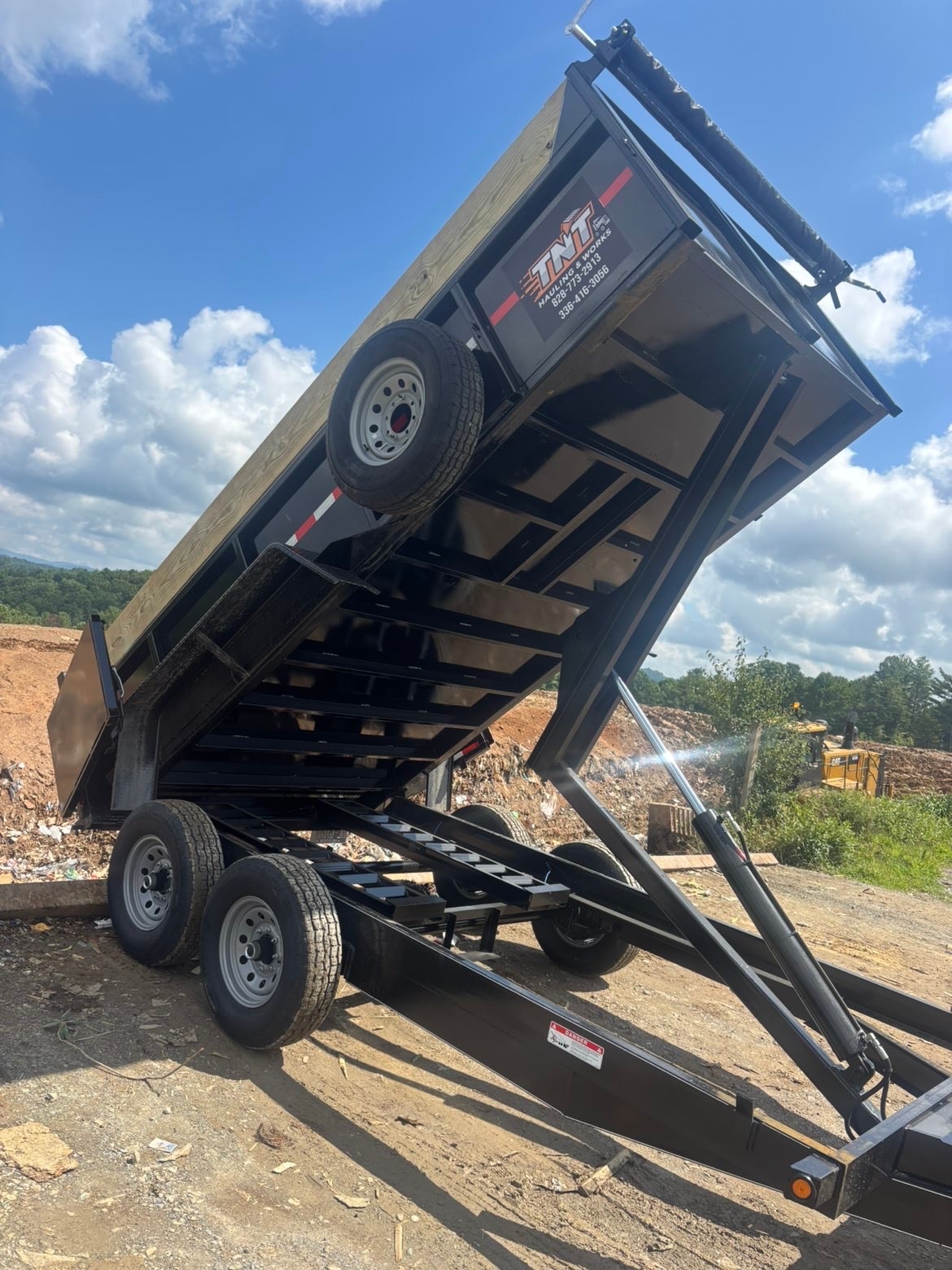 TNT dump trailer at work